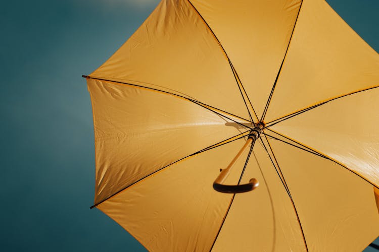 an opened yellow umbrella